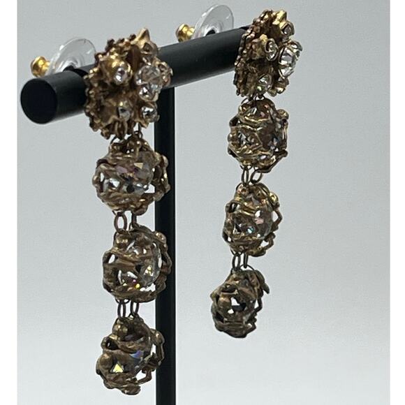 Vintage Gold-Tone Filigree Drop Rhinestone Accents
Statement Dangle Earrings - Picture 9 of 15